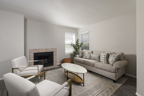 Modern living room with fireplace at The Nova, Memphis, TN